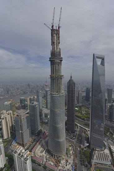 上海中心原计划2014年竣工,现在据说竣工时间已推迟到2015年。 上海中心原计划2014年竣工,现在据说竣工时间已推迟到2015年。