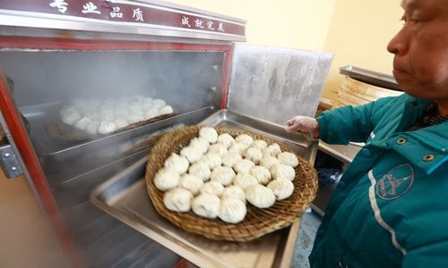 庆丰包子空运长沙 摊位火热(图)