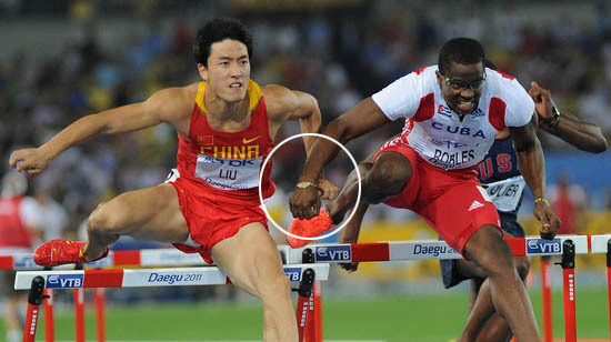 罗伯斯碰撞刘翔被取消金牌 刘翔铜牌改为银牌